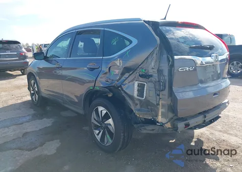2015 Honda Cr-V Touring z USA, uszkodzony, nr VIN 5J6RM3H94FL020849
